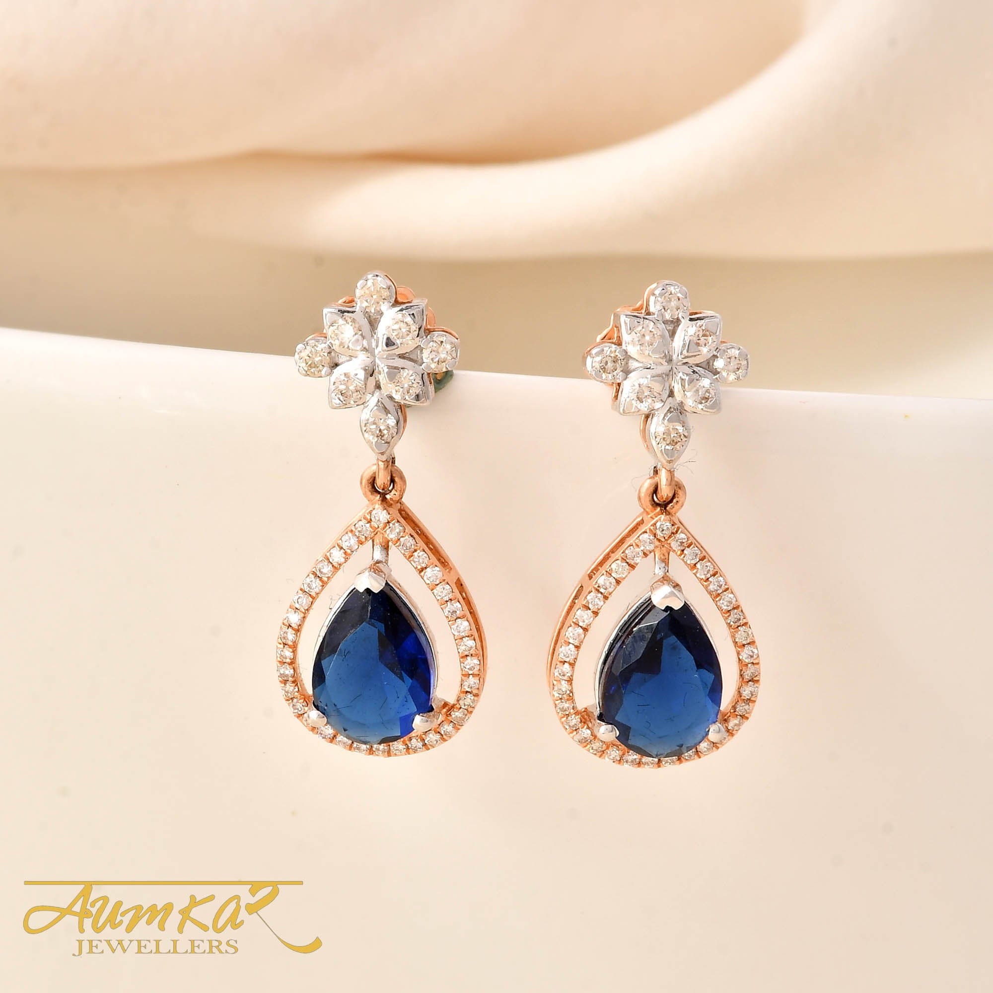 Blue Teardrop Dangle Earrings With Diamond Flower Studs